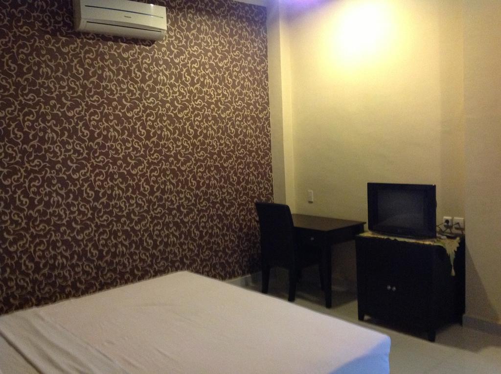 Carolina Transit Hotel Medan Cameră foto